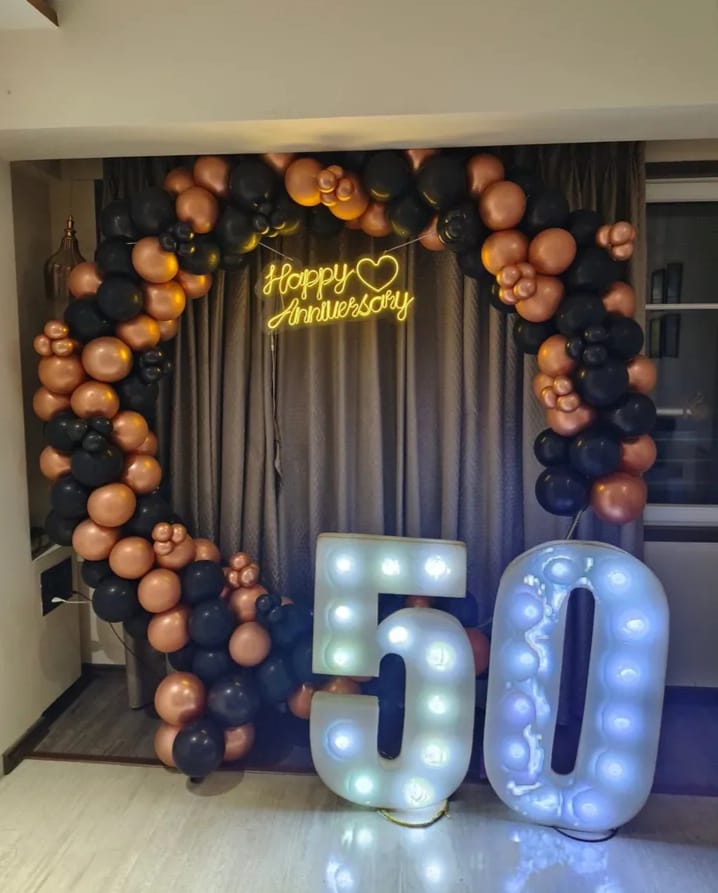 Elegant Black and Gold Anniversary Hoop Backdrop