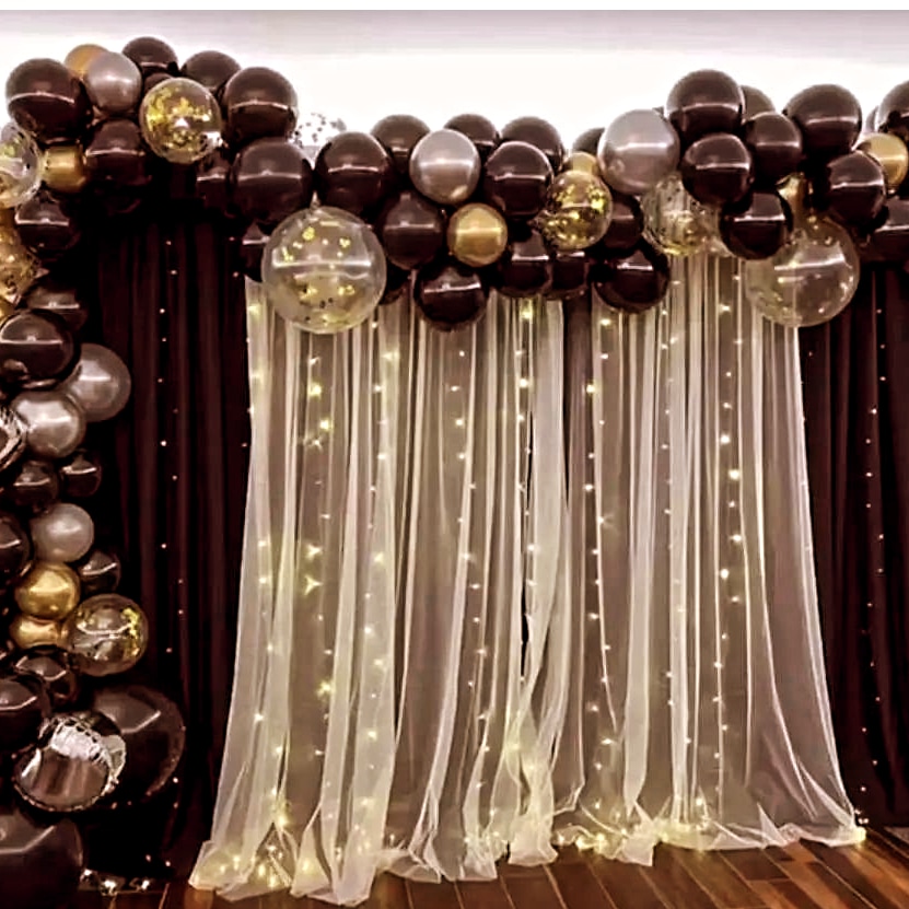 Elegant Black and Gold Balloon Backdrop with Fairy Lights